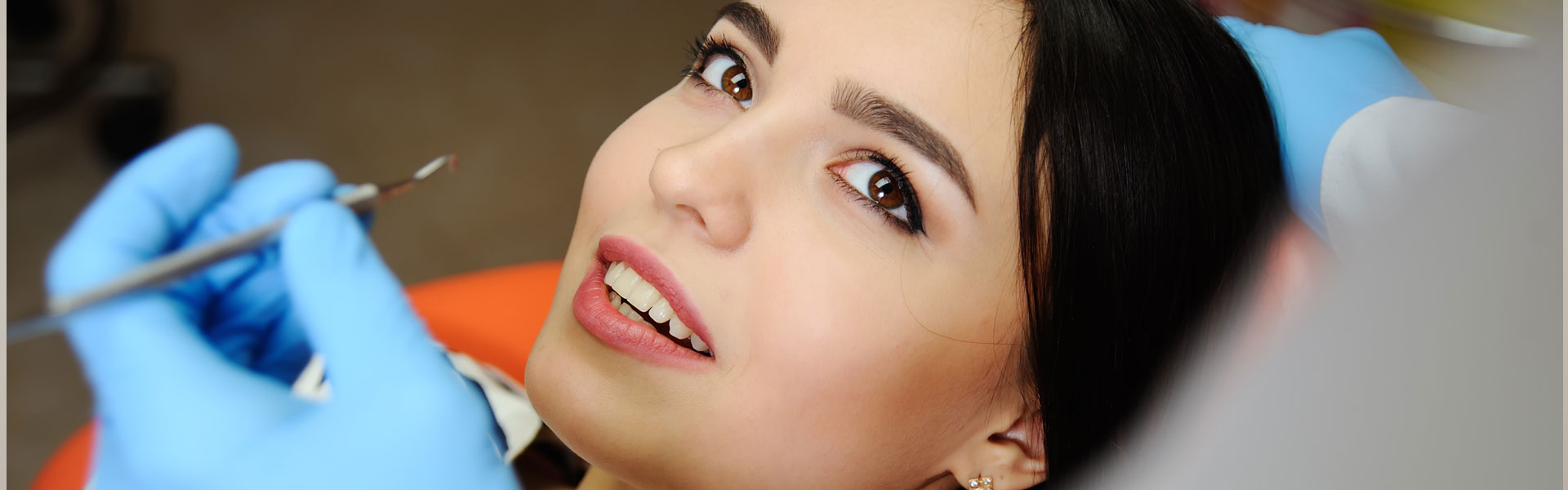 Beautiful girl in a dental chair