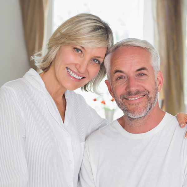 Smiling middle aged couple