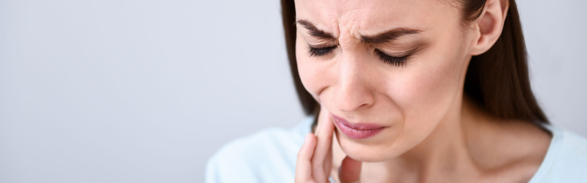 Woman suffering from toothache