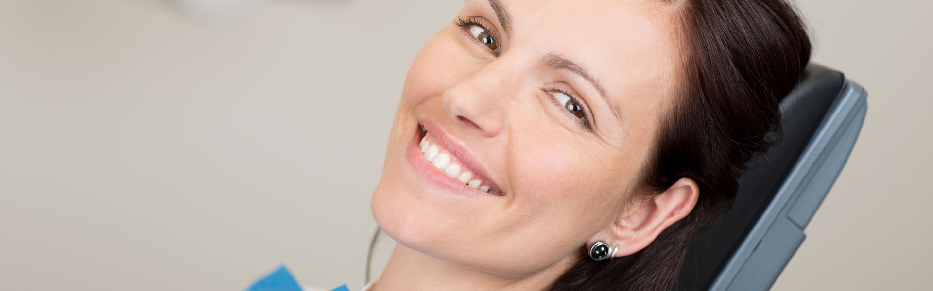 Woman sitting on dental chair